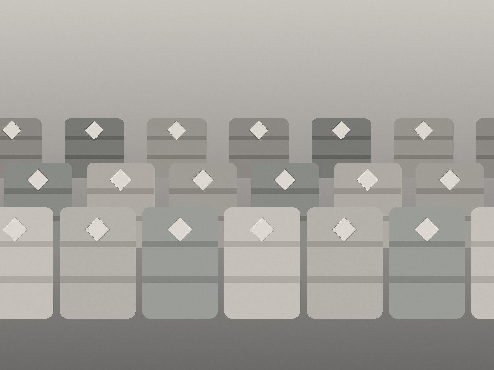 Ordered rows of chemical drums and IBC totes carrying diamond hazard placards